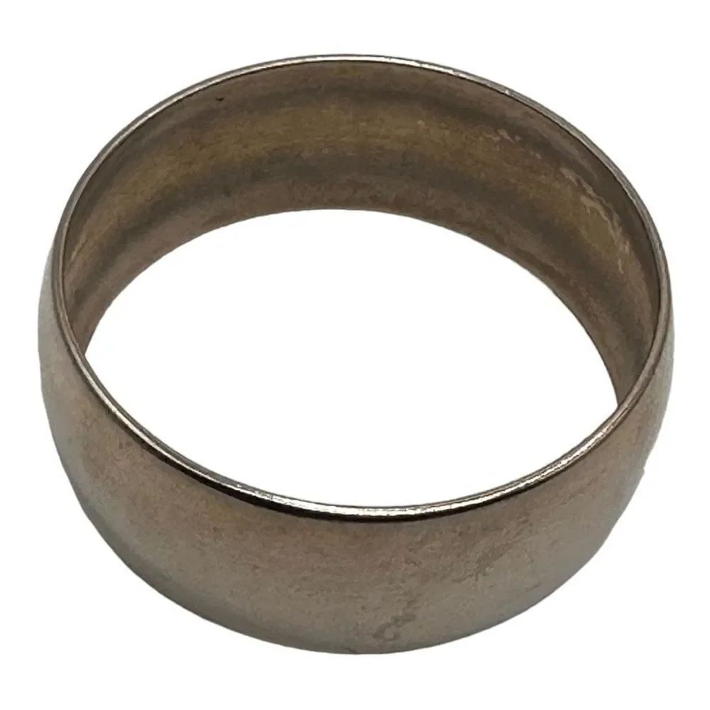 Silver bangle bracelet approx 1 inch wide and 2.5 inches in diameter